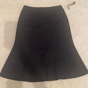 Women’s sparkly black mid length/midi skirt